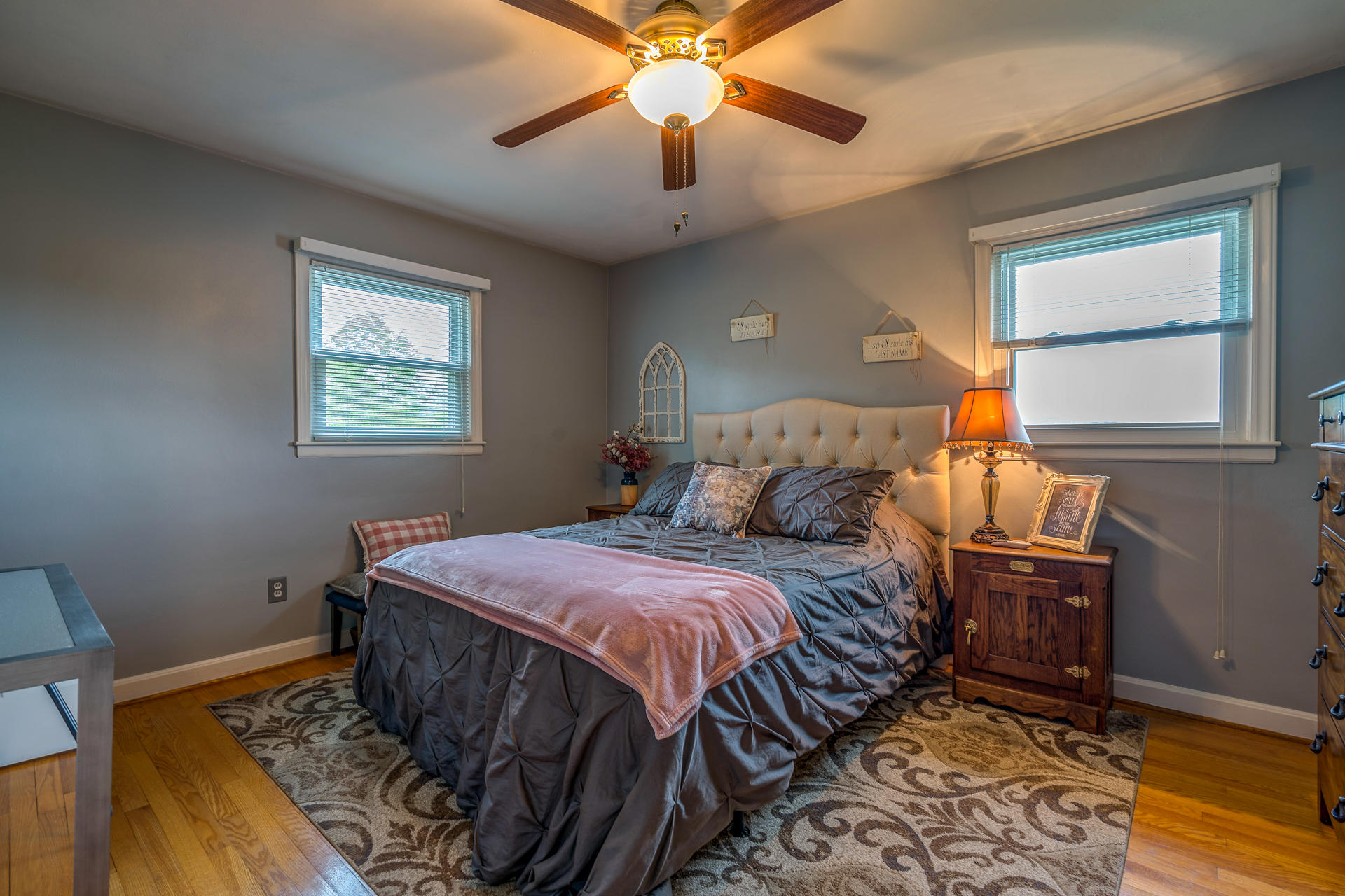 1672 Blankenship Road Goodview, VA 24095 - Photo 23 of 39 a bedroom with a bed and wooden floor