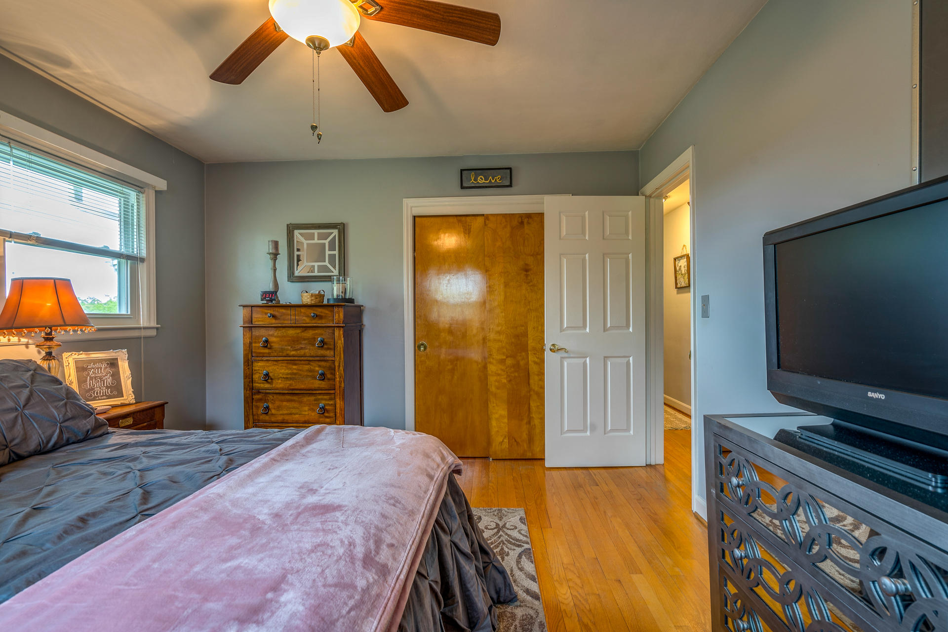 1672 Blankenship Road Goodview, VA 24095 - Photo 24 of 39 a bedroom with a bed and a flat screen tv
