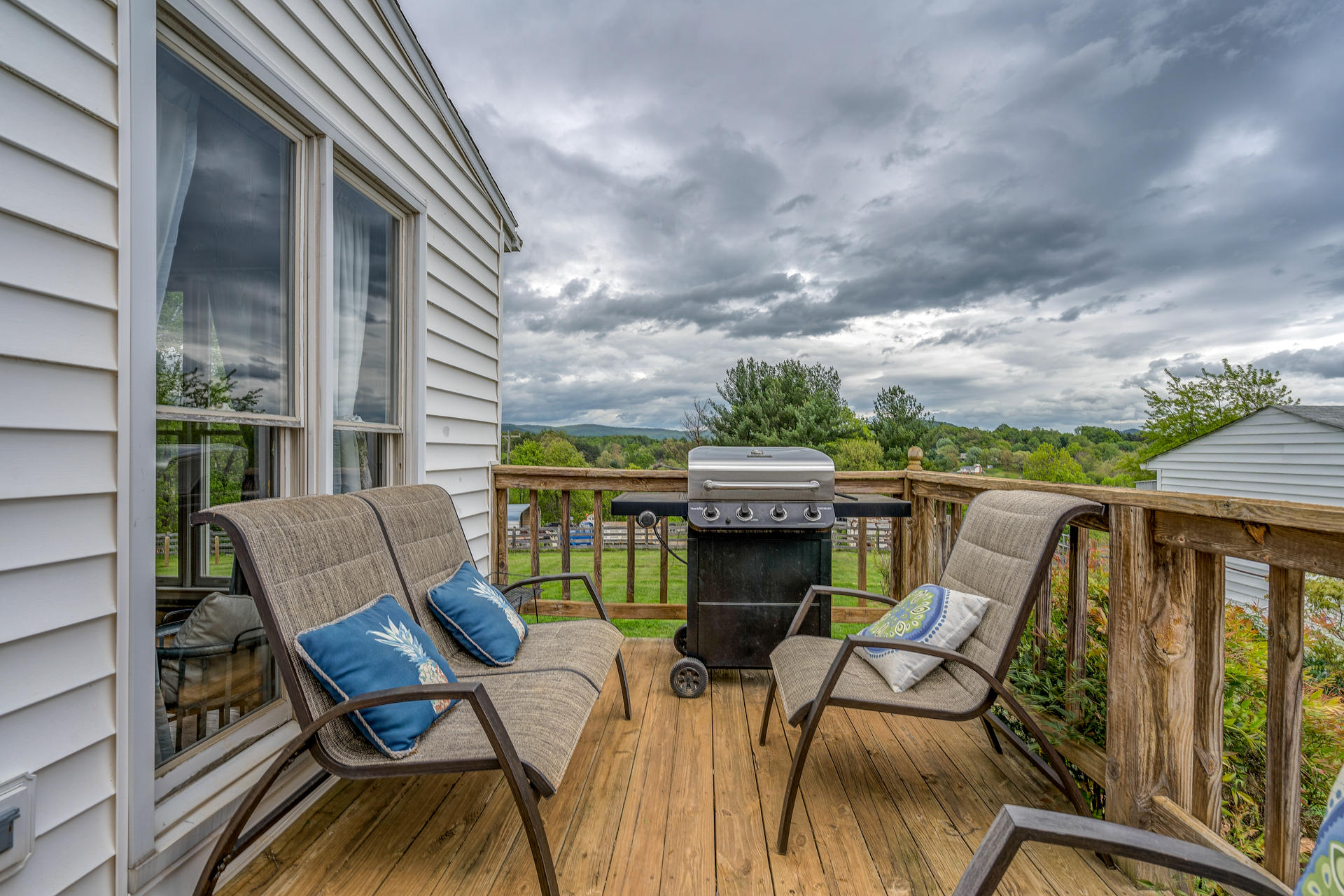 1672 Blankenship Road Goodview, VA 24095 - Photo 25 of 39 a view of an chairs and table in the balcony