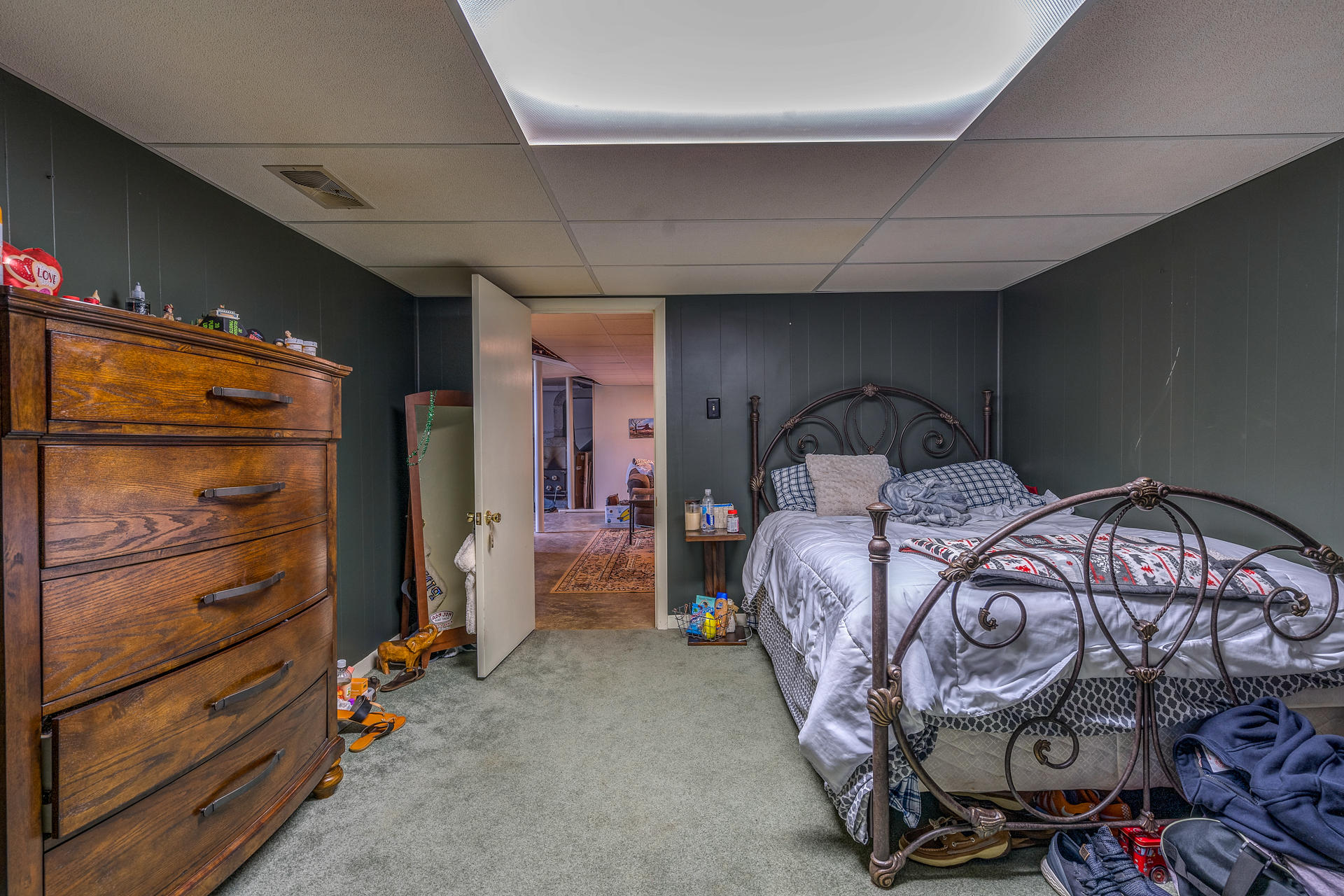 1672 Blankenship Road Goodview, VA 24095 - Photo 30 of 39 a bedroom with a bed and a mirror
