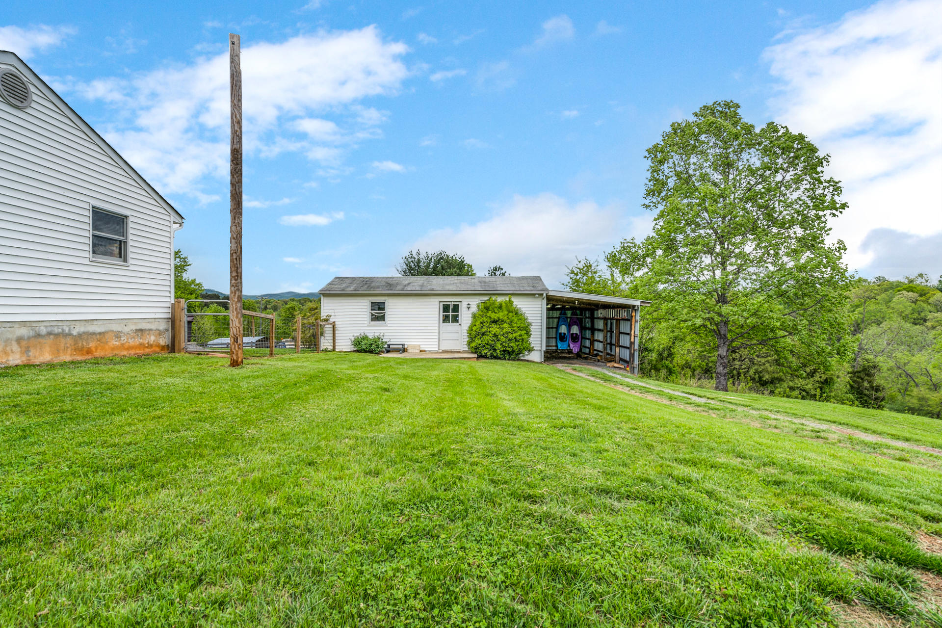 1672 Blankenship Road Goodview, VA 24095 - Photo 34 of 39 a house view with a garden space