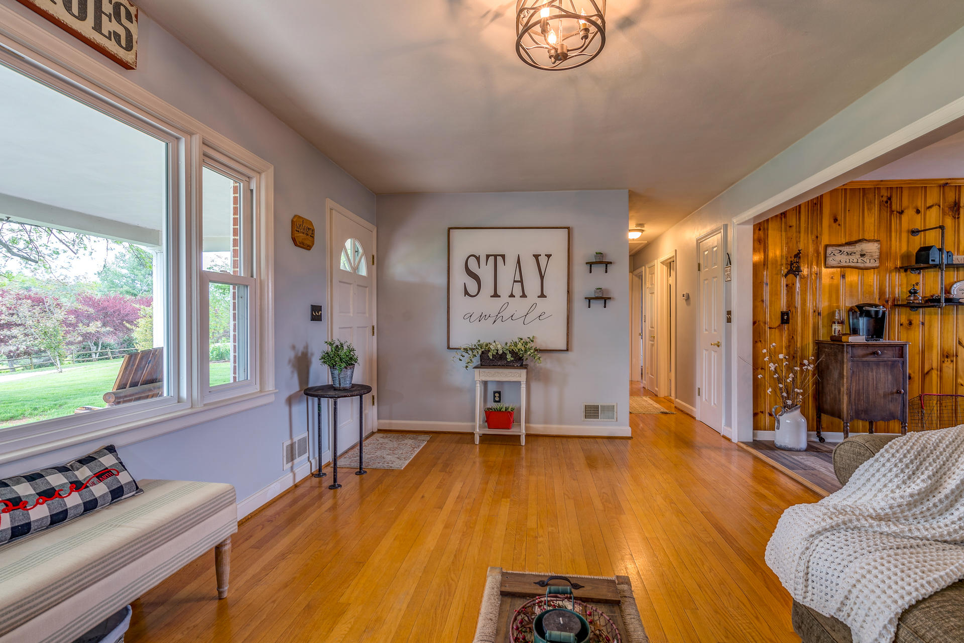 1672 Blankenship Road Goodview, VA 24095 - Photo 5 of 39 a living room with furniture and wooden floor