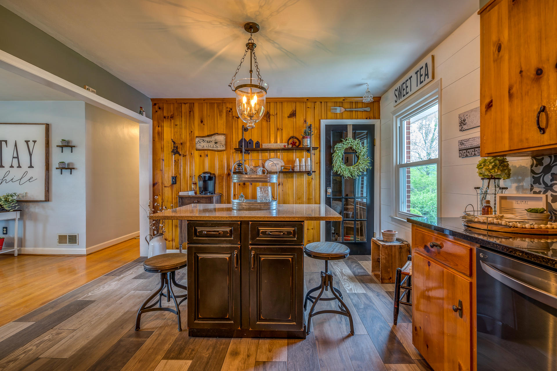 1672 Blankenship Road Goodview, VA 24095 - Photo 9 of 39 a view of a dining room with furniture window and wooden floor
