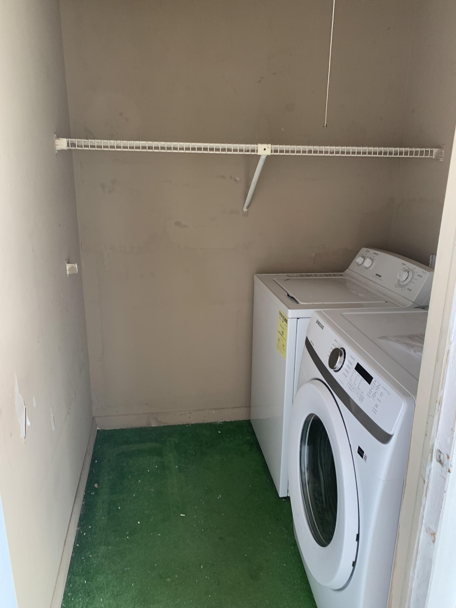 415 Monaco Way Delray Beach, FL 33446 - Photo 16 of 56 Balcony and storage room-laundry