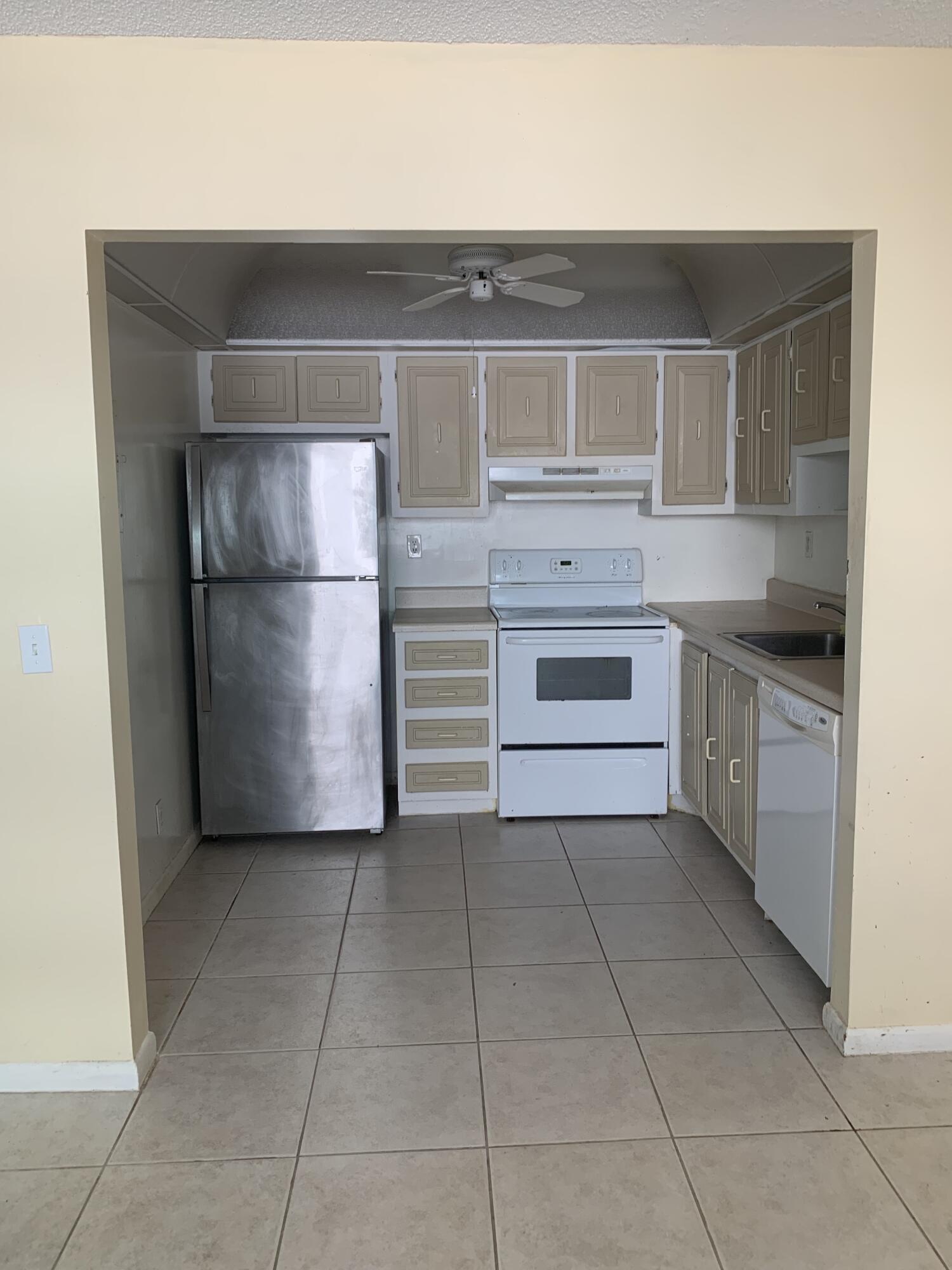 415 Monaco Way Delray Beach, FL 33446 - Photo 5 of 56 Kitchen from dining area