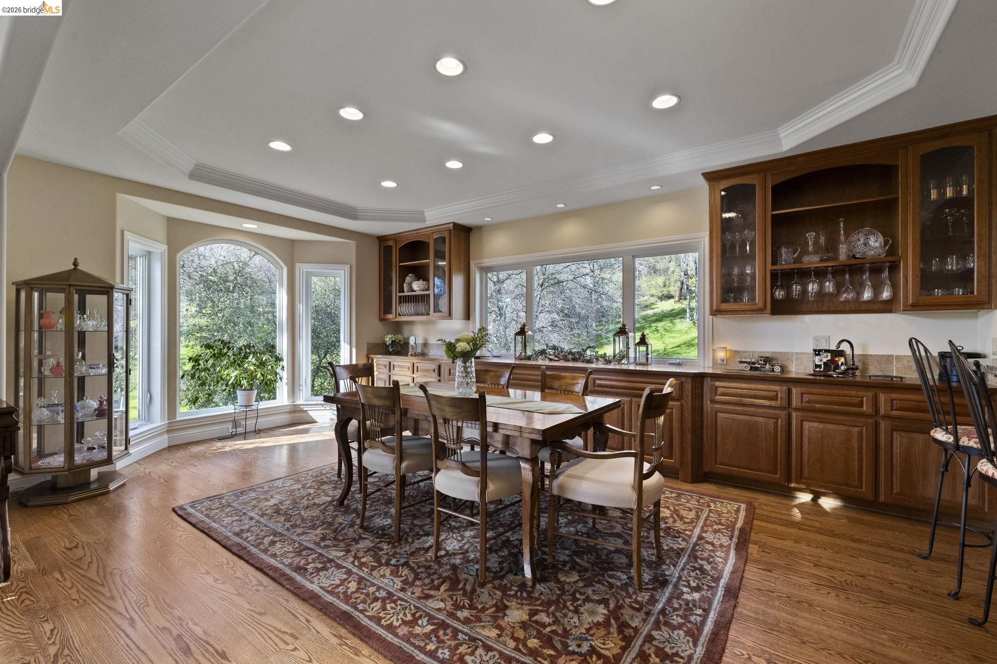 18558 Olov Road Sonora, CA 95370 - Photo 11 of 45 a view of a dining room with furniture window and wooden floor