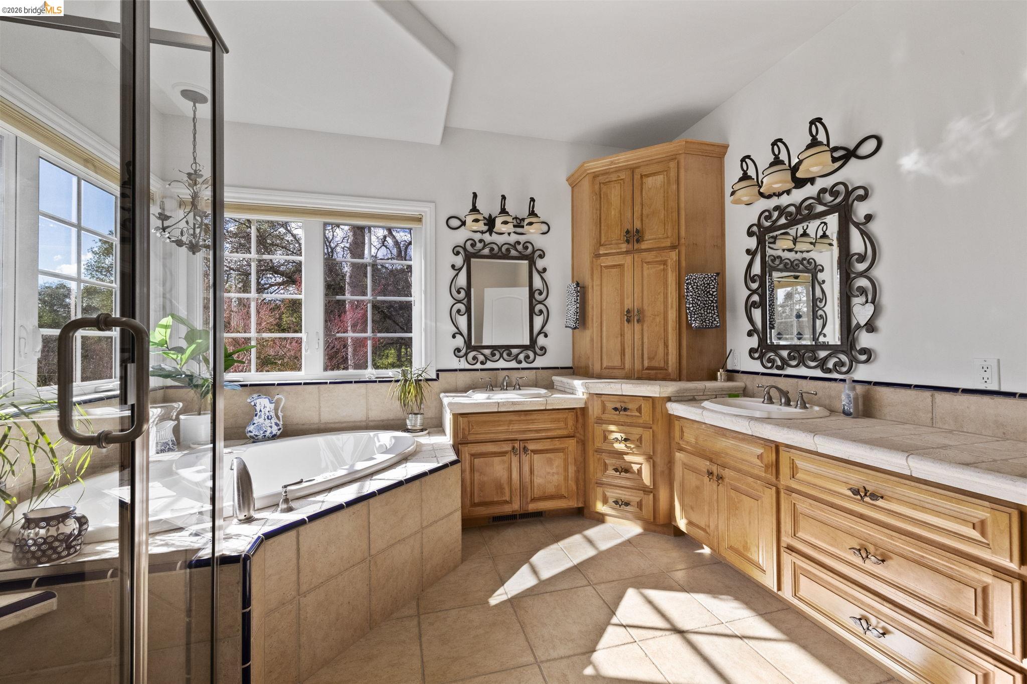 18558 Olov Road Sonora, CA 95370 - Photo 27 of 45 a large kitchen with kitchen island granite countertop a sink and a stove