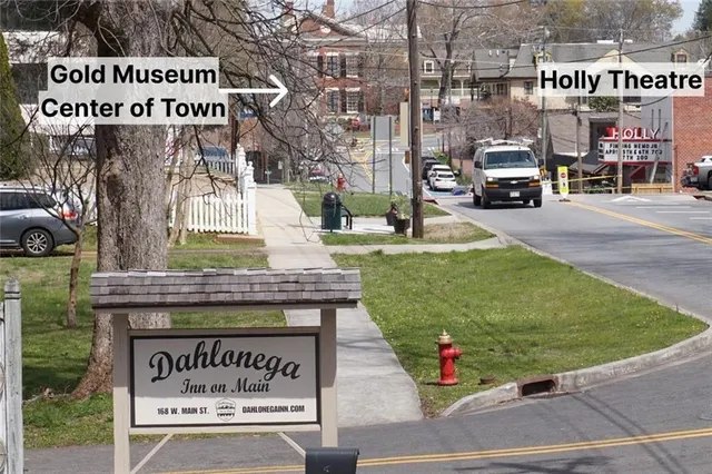 a front view of a building with street view