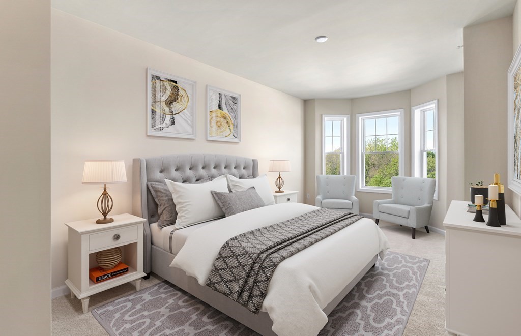 2 Stratton Drive, Unit 303 Woburn, MA 01801 - Photo 5 of 8 a bedroom with bed and window