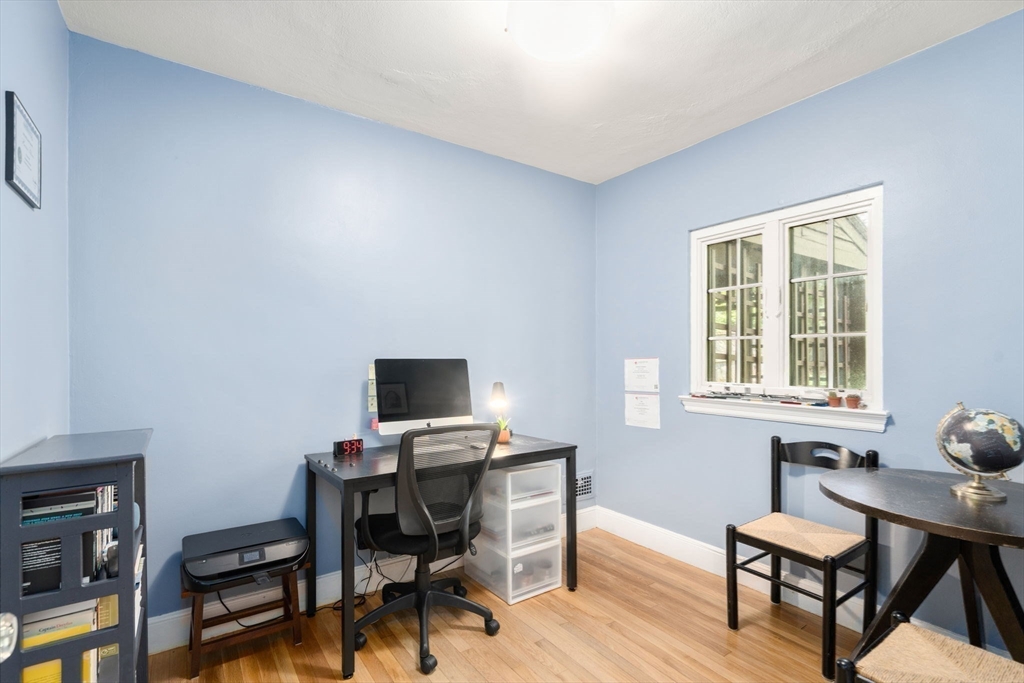 36 Blake Road Brookline, MA 02445 - Photo 13 of 34 a view of a workspace with furniture and a window