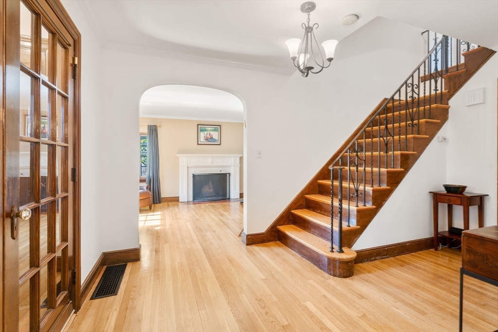 36 Blake Road Brookline, MA 02445 - Photo 18 of 34 a view of entryway and hall with wooden floor