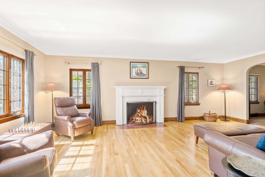 36 Blake Road Brookline, MA 02445 - Photo 2 of 34 a living room with furniture and a fireplace
