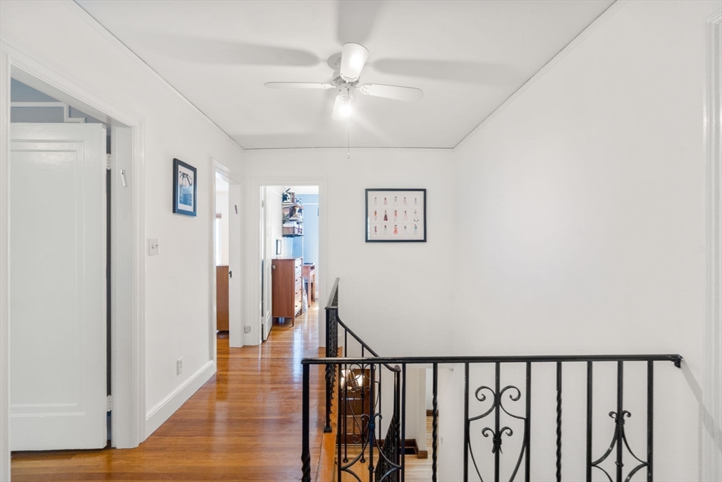 36 Blake Road Brookline, MA 02445 - Photo 21 of 34 a view of a hallway with wooden floor