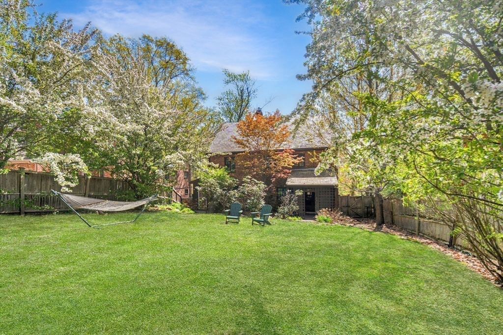 36 Blake Road Brookline, MA 02445 - Photo 6 of 34 a view of a house with a yard
