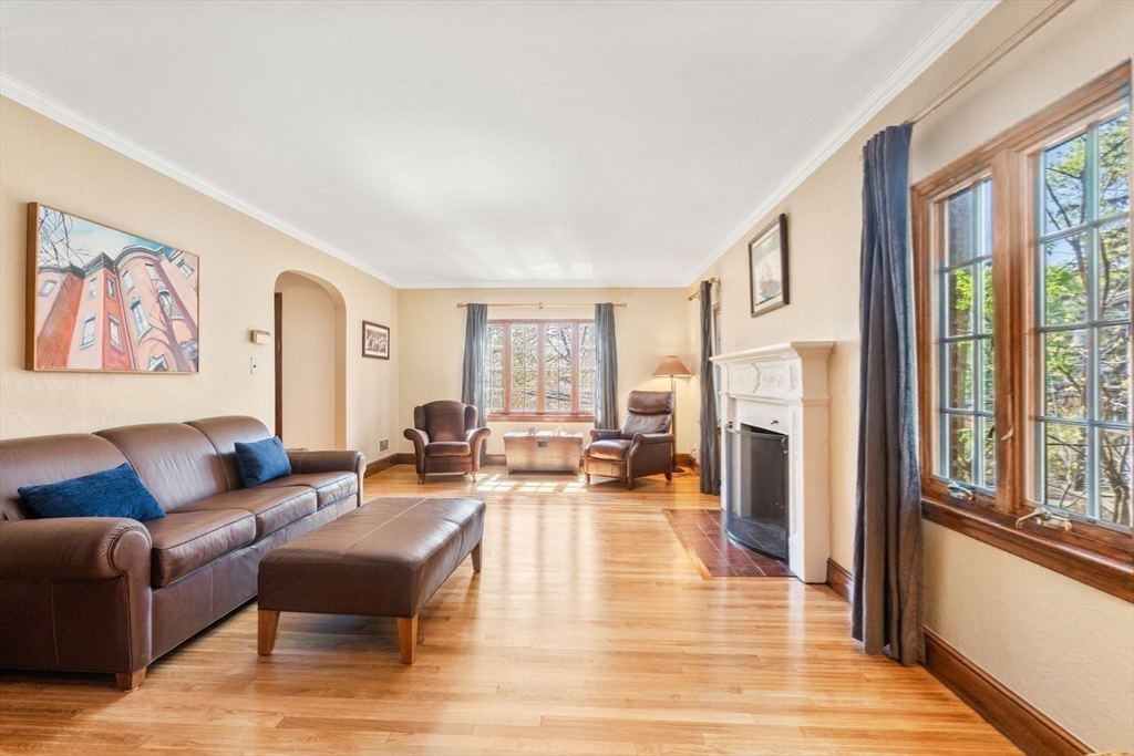 36 Blake Road Brookline, MA 02445 - Photo 10 of 34 a living room with furniture and large windows