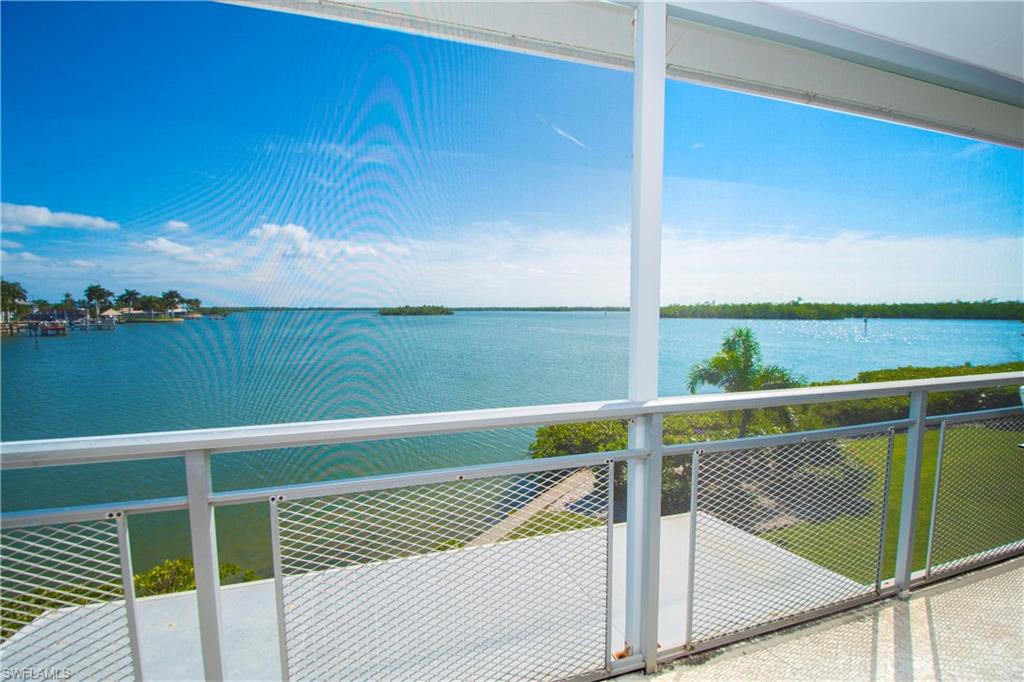 330 Kon Tiki Drive, Unit A2 Naples, FL 34113 - Photo 6 of 19 a view of outdoor space and barbecue grill