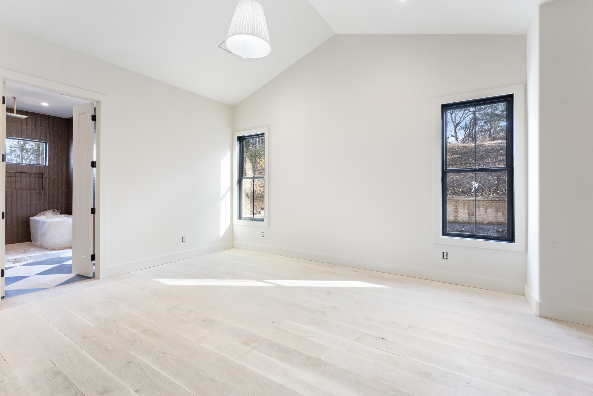 7678 Sawyer Brown Road Nashville, TN 37209 - Photo 19 of 77 a view of an empty room with a window