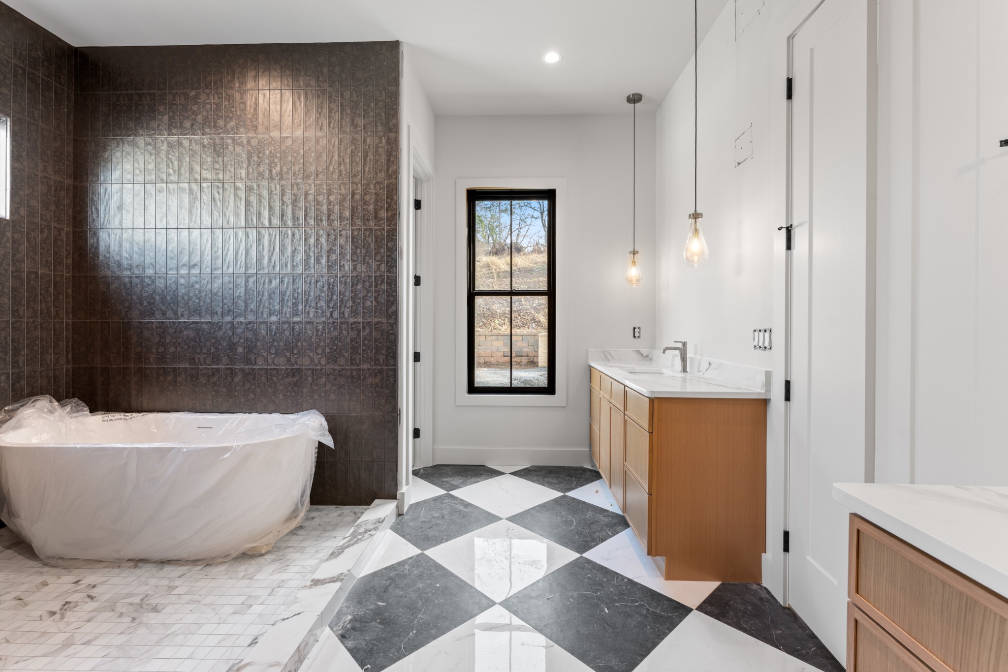 7678 Sawyer Brown Road Nashville, TN 37209 - Photo 23 of 77 a bathroom with a bathtub and shower