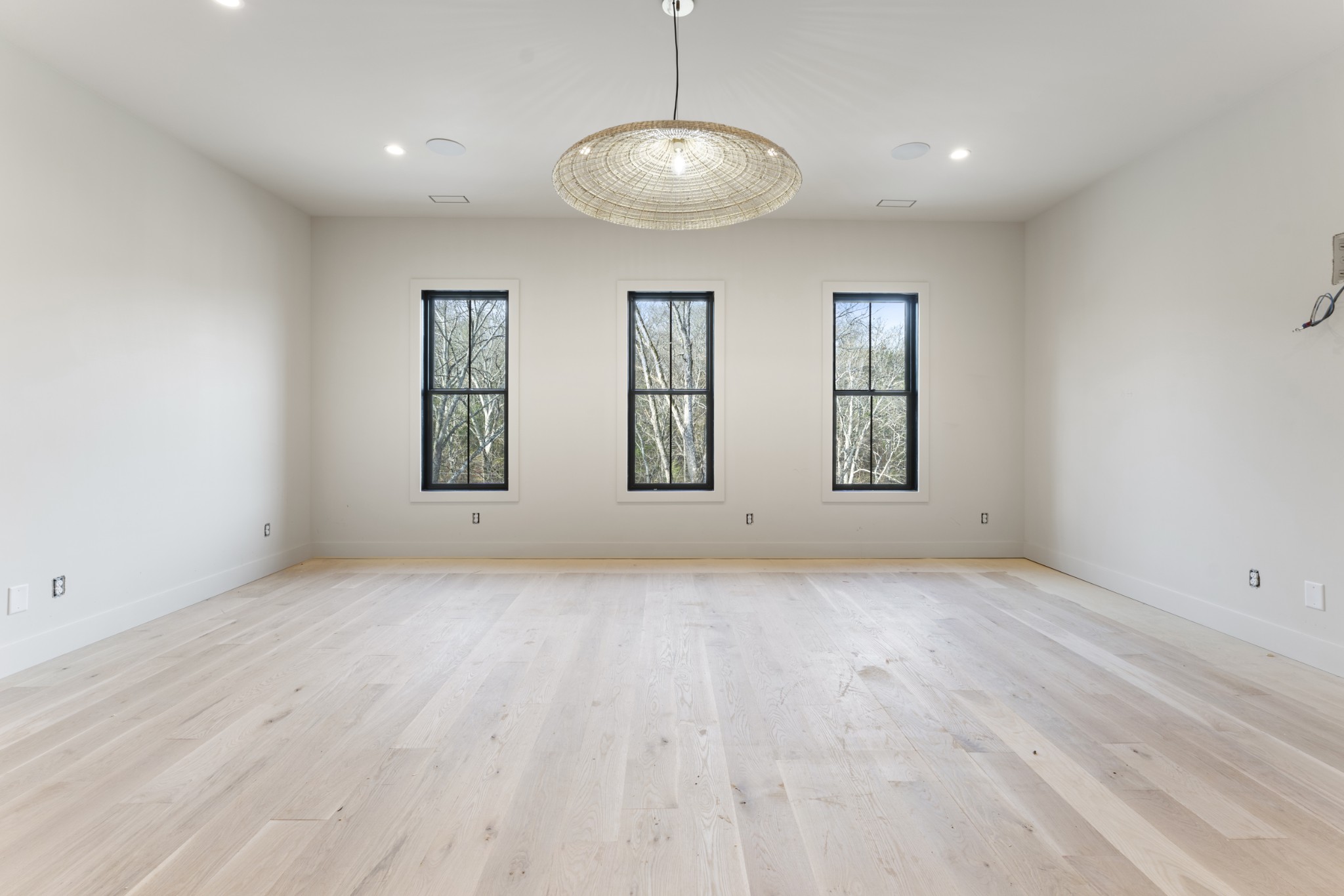 7678 Sawyer Brown Road Nashville, TN 37209 - Photo 26 of 77 an empty room with windows and chandelier