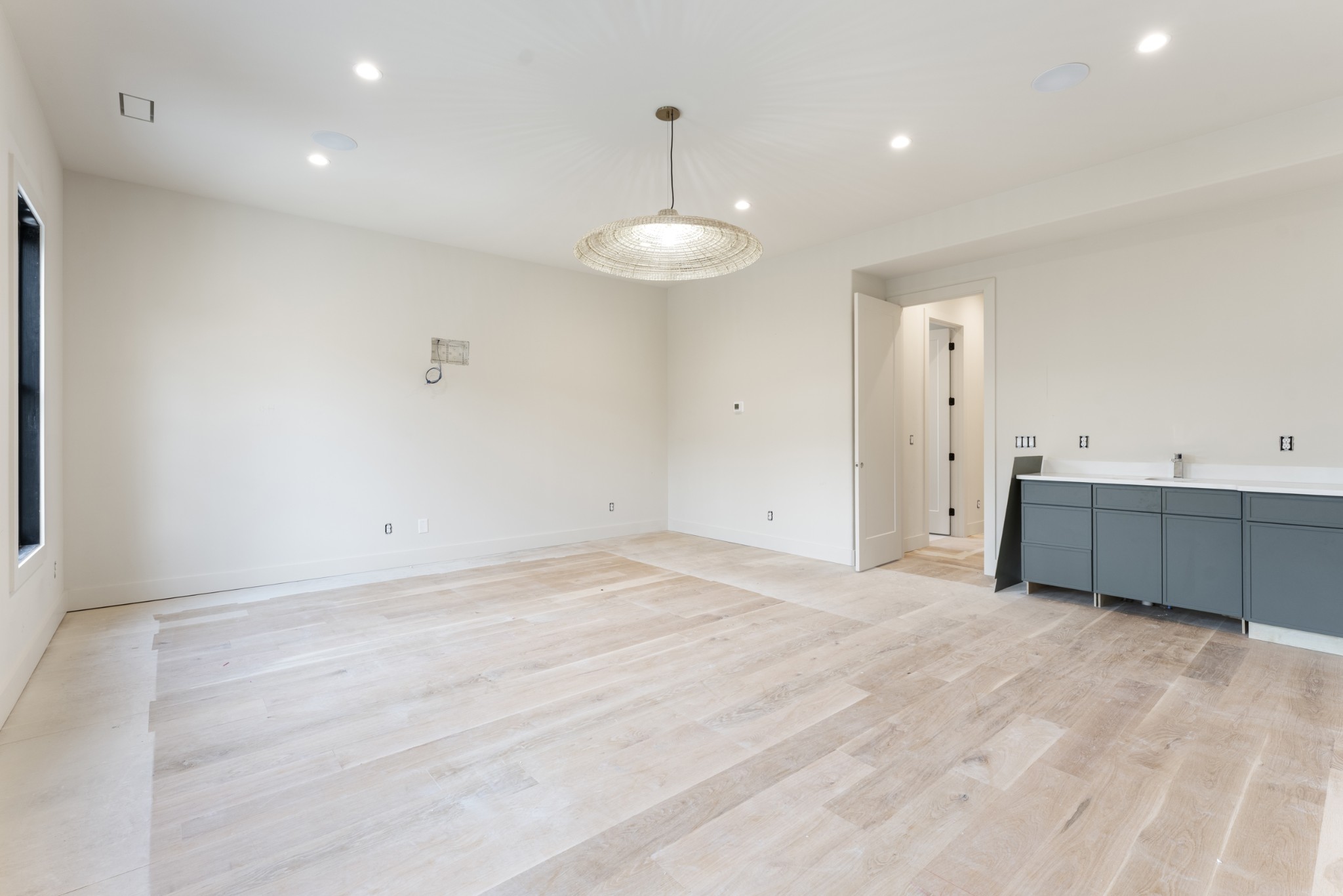 7678 Sawyer Brown Road Nashville, TN 37209 - Photo 27 of 77 a view of a kitchen with a sink and chandelier