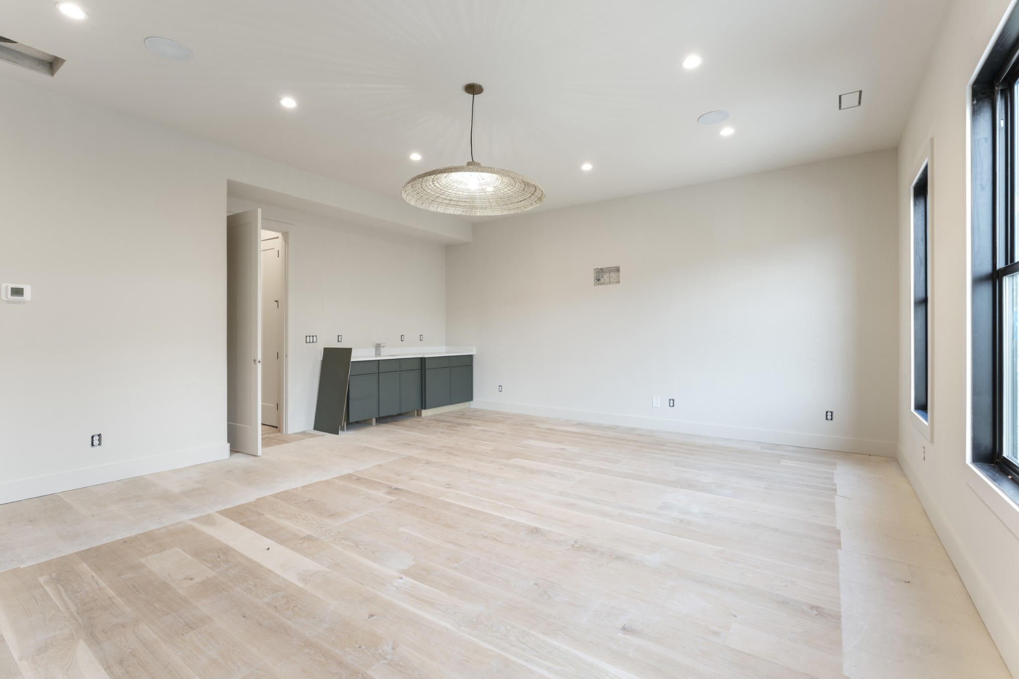 7678 Sawyer Brown Road Nashville, TN 37209 - Photo 28 of 77 a view of an empty room with a fireplace and a window