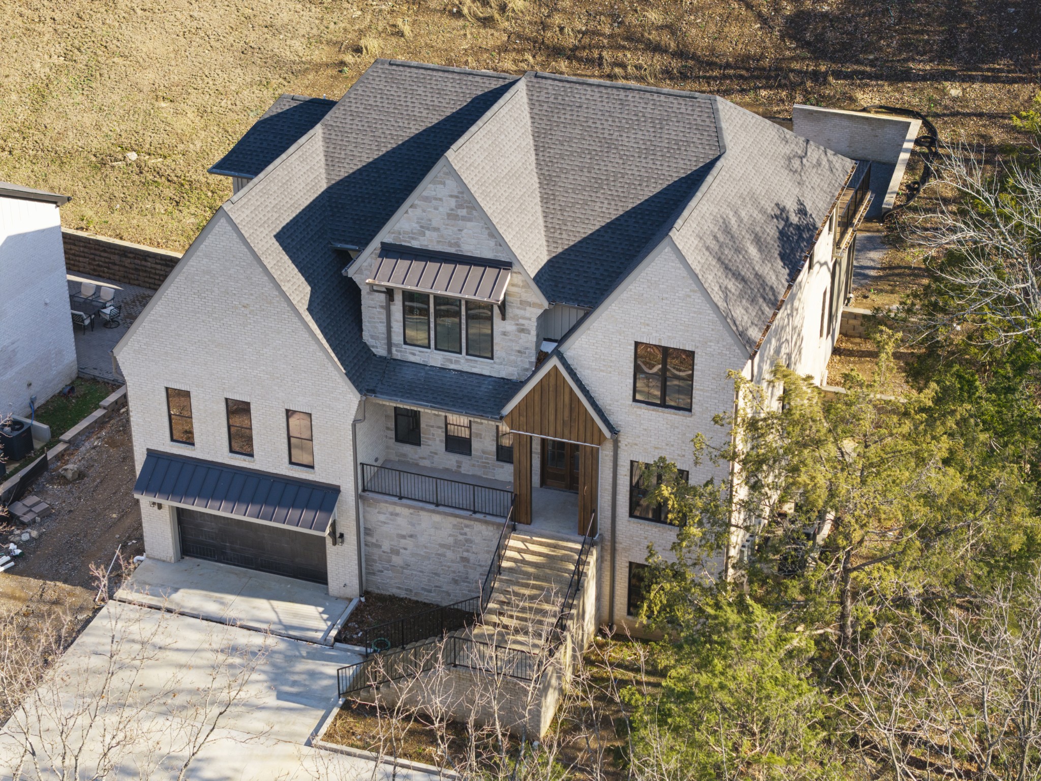 7678 Sawyer Brown Road Nashville, TN 37209 - Photo 3 of 77 a front view of a house with a yard