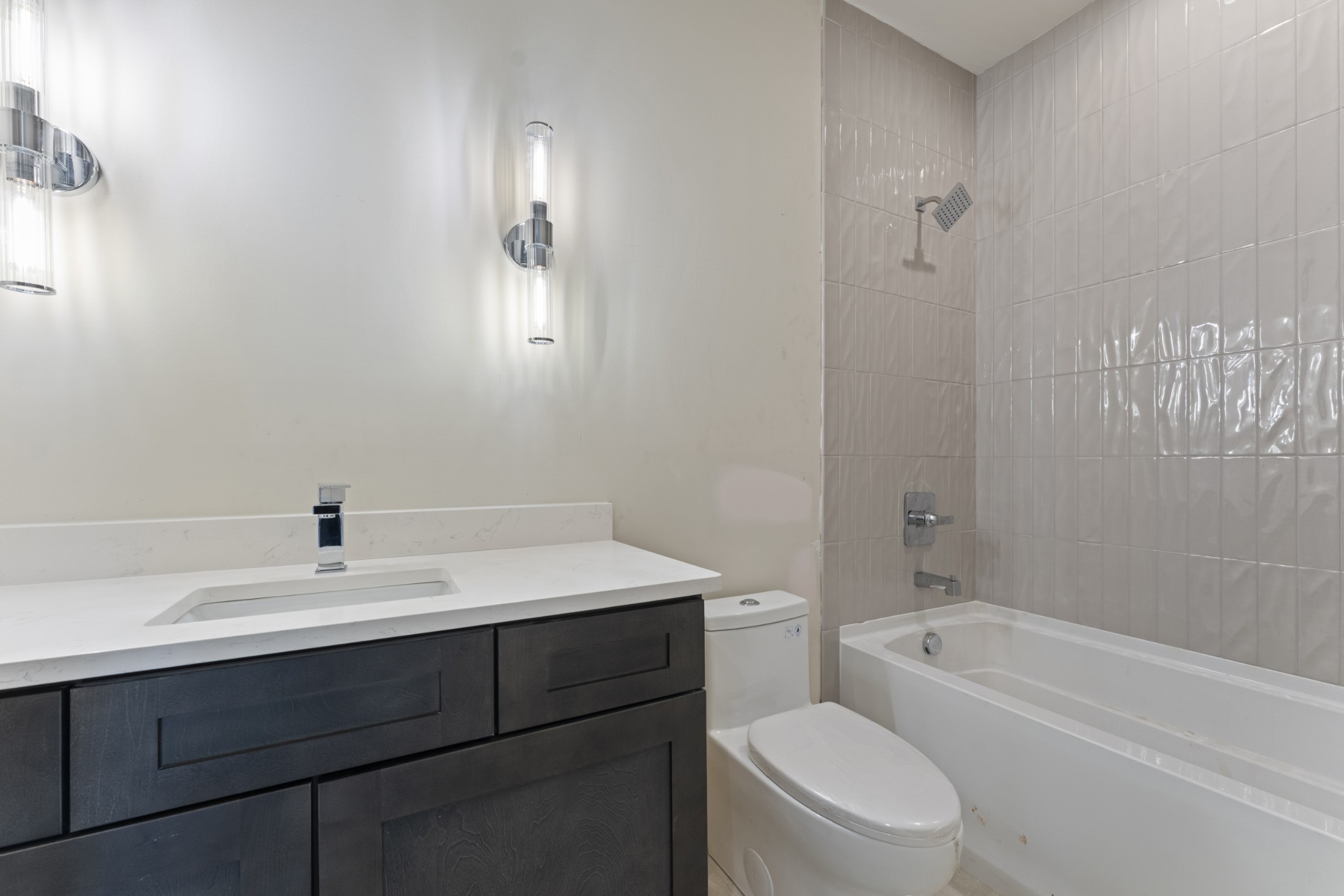 7678 Sawyer Brown Road Nashville, TN 37209 - Photo 46 of 77 a bathroom with a sink toilet vanity and bathtub