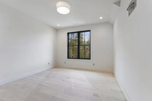 a aerial view of a house with a yard