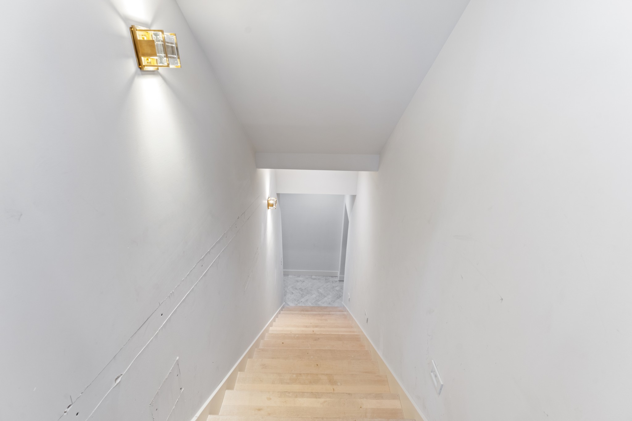 7678 Sawyer Brown Road Nashville, TN 37209 - Photo 51 of 77 a view of a hallway with wooden floor