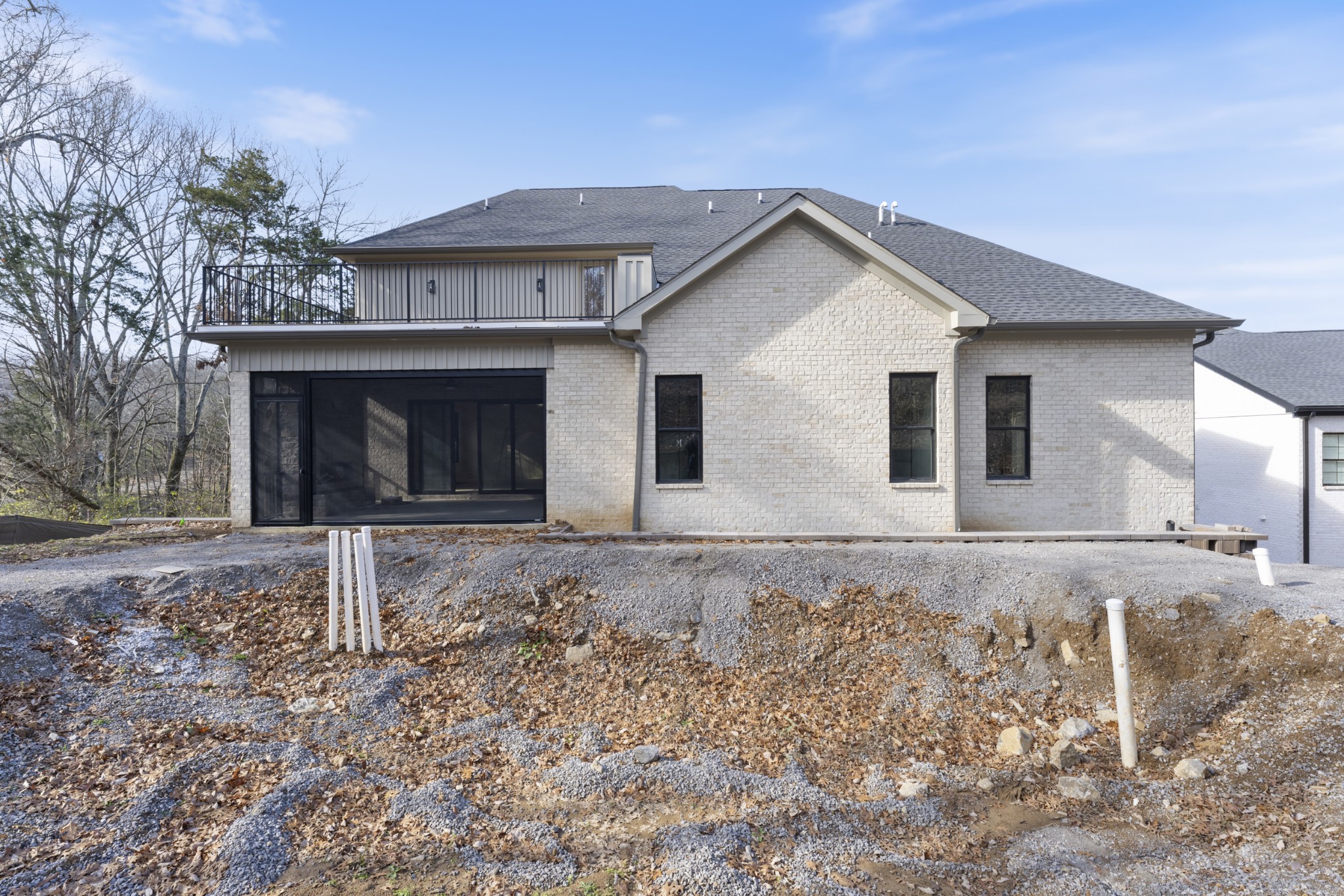 7678 Sawyer Brown Road Nashville, TN 37209 - Photo 67 of 77 a view of a house with a yard and garage