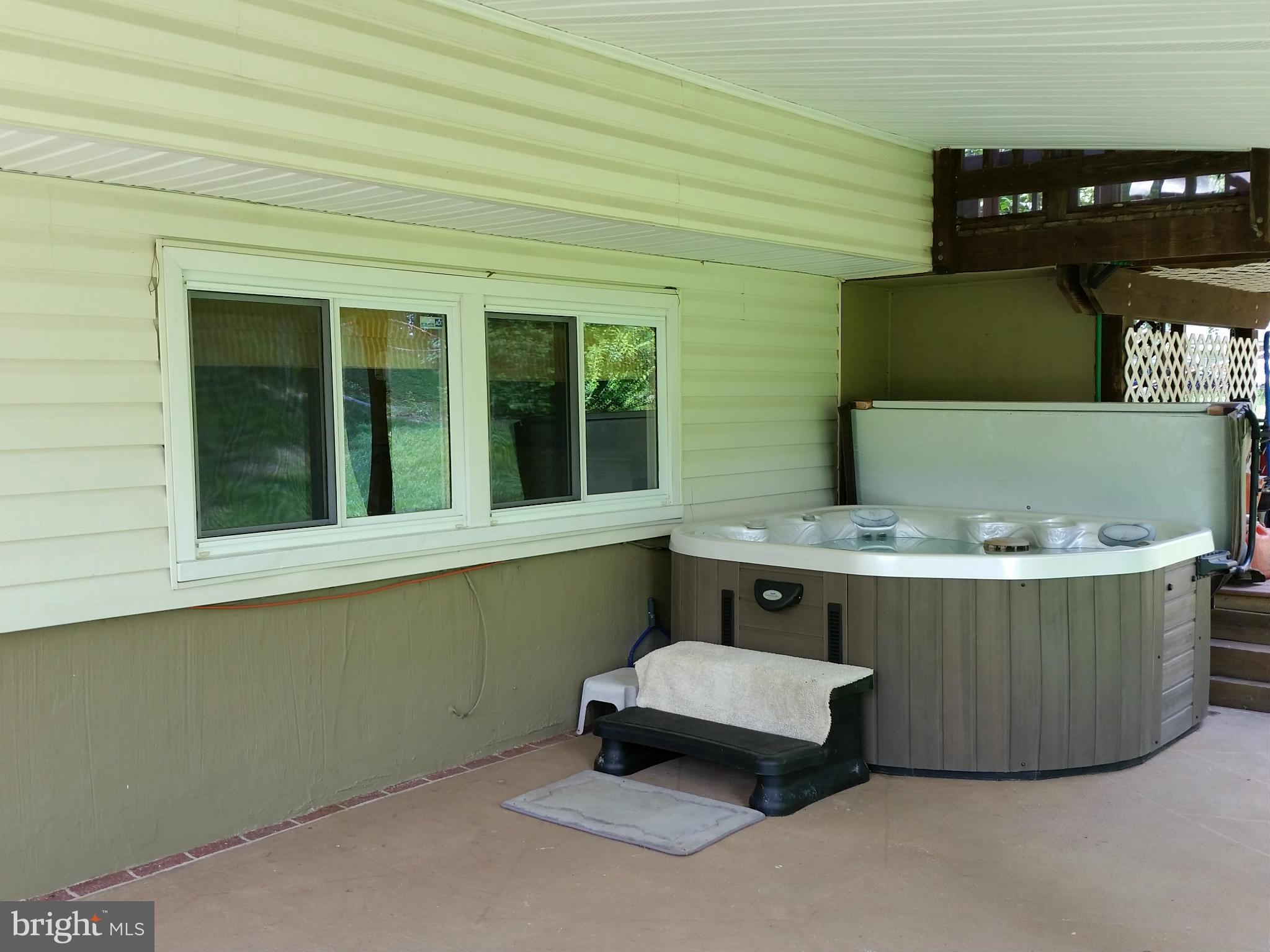 12905 Sturbridge Road Woodbridge, VA 22192 - Photo 24 of 30 Patio with Hot Tub