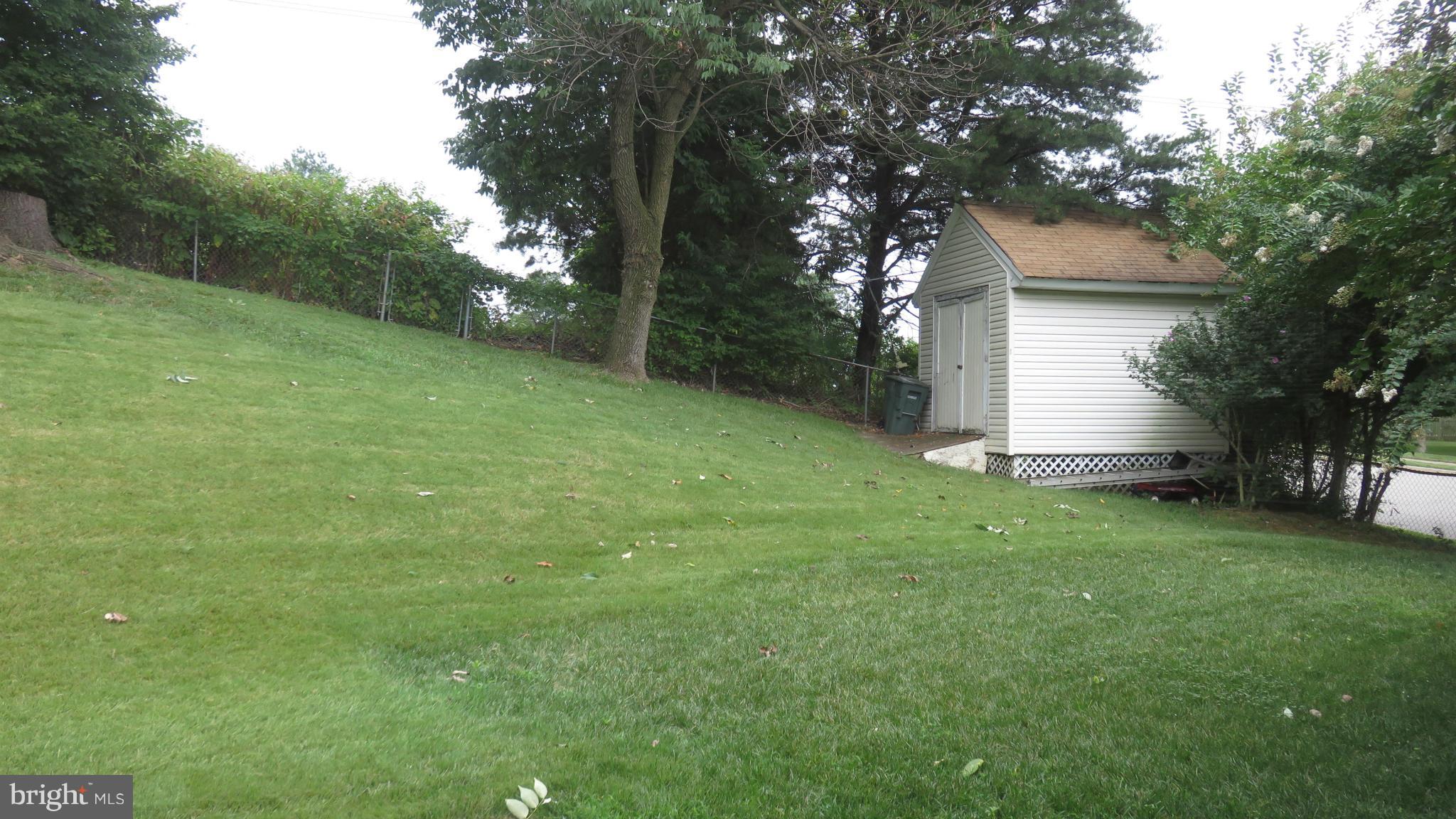 12905 Sturbridge Road Woodbridge, VA 22192 - Photo 27 of 30 Rear view and storage shed