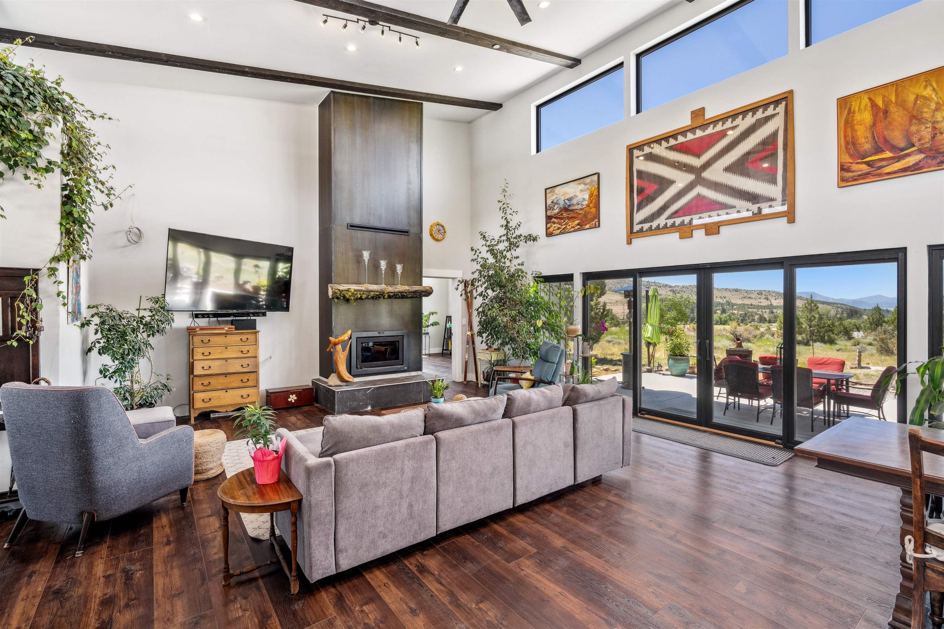 134 Smithneck Road Loyalton, CA 96118 - Photo 23 of 26 a living room with fireplace furniture and a large window