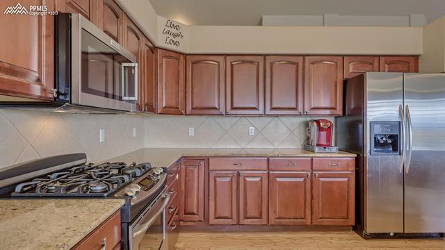 9750 Rockingham Drive Peyton, CO 80831 - Photo 9 of 35 Gallery Image 9