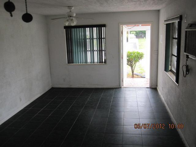 1060 West 3rd Street Riviera Beach, FL 33404 - Photo 3 of 10 a view of an entryway