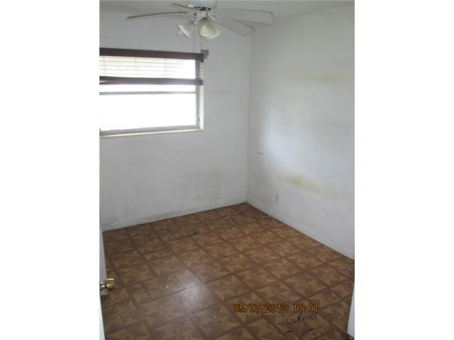 1060 West 3rd Street Riviera Beach, FL 33404 - Photo 5 of 10 a view of an empty room