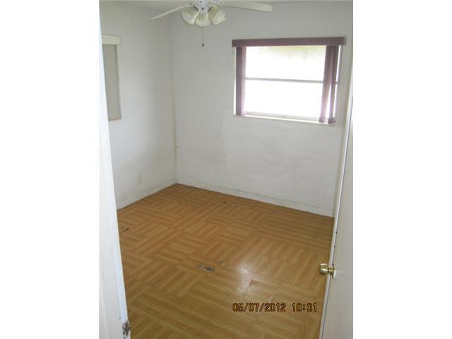 1060 West 3rd Street Riviera Beach, FL 33404 - Photo 7 of 10 a view of empty room with windows