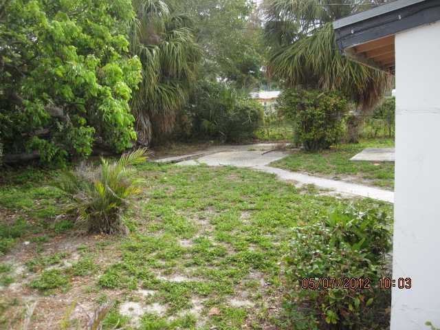 1060 West 3rd Street Riviera Beach, FL 33404 - Photo 9 of 10 a view of backyard with green space