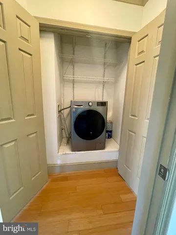 a bathroom with a sink and a shower