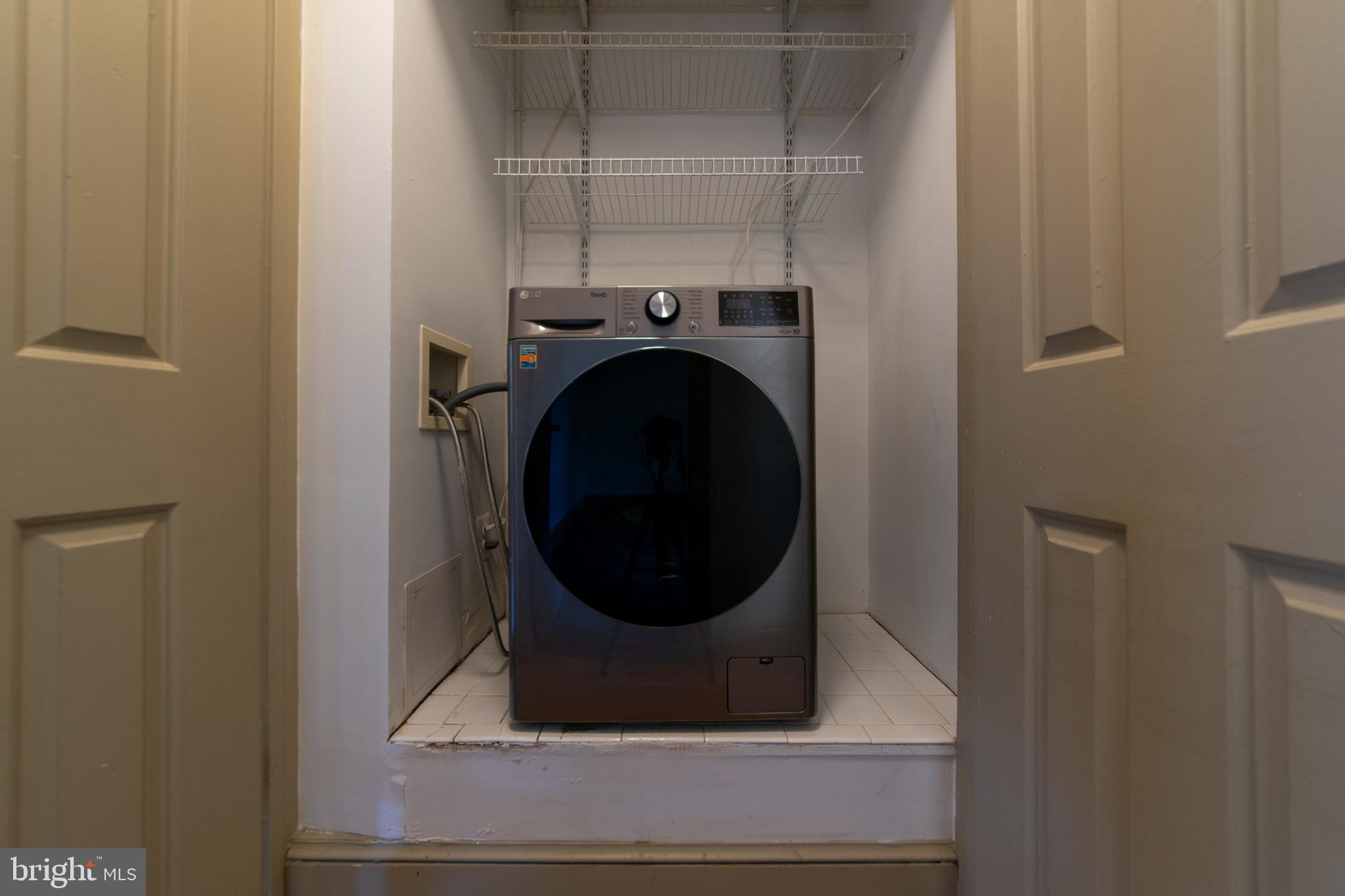 1363 K Street Southeast, Unit 103 Washington, DC 20003 - Photo 12 of 19 a view of a utility room with dryer and washer