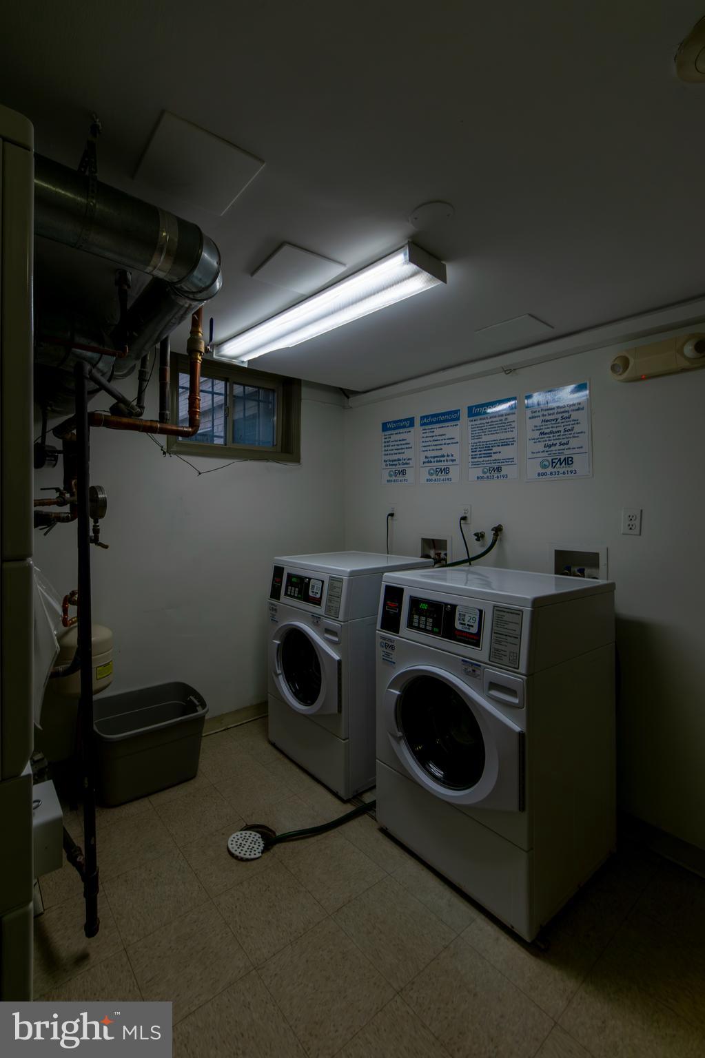1363 K Street Southeast, Unit 103 Washington, DC 20003 - Photo 17 of 19 a utility room with dryer and washer