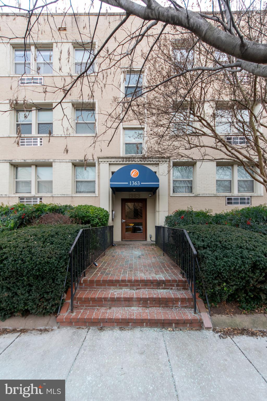1363 K Street Southeast, Unit 103 Washington, DC 20003 - Photo 18 of 19 a front view of a house with garden