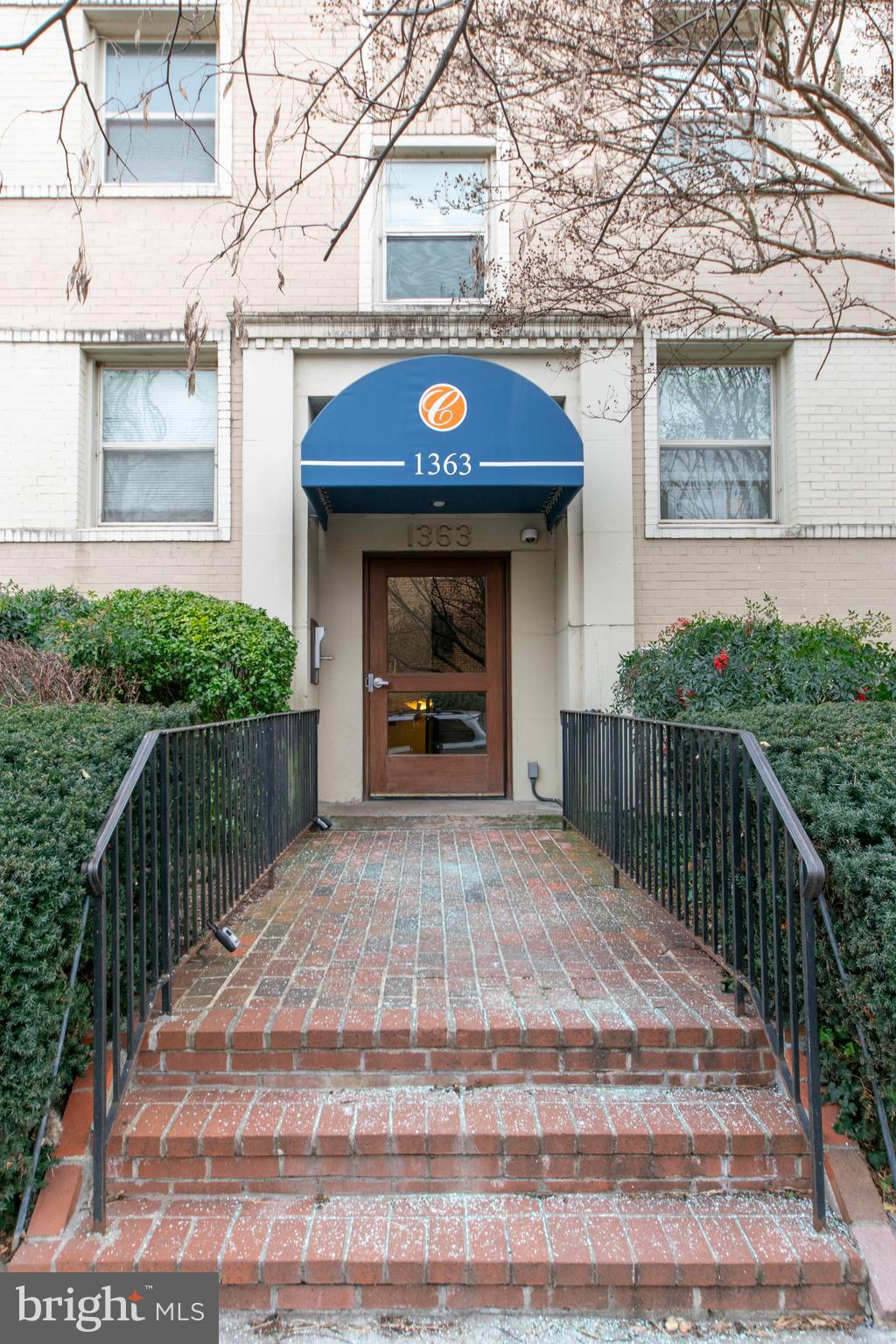 1363 K Street Southeast, Unit 103 Washington, DC 20003 - Photo 19 of 19 a front view of a house with a yard