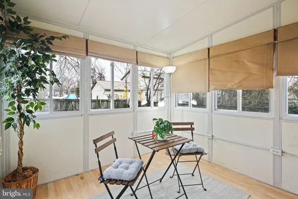 a dining room with furniture window wooden floor