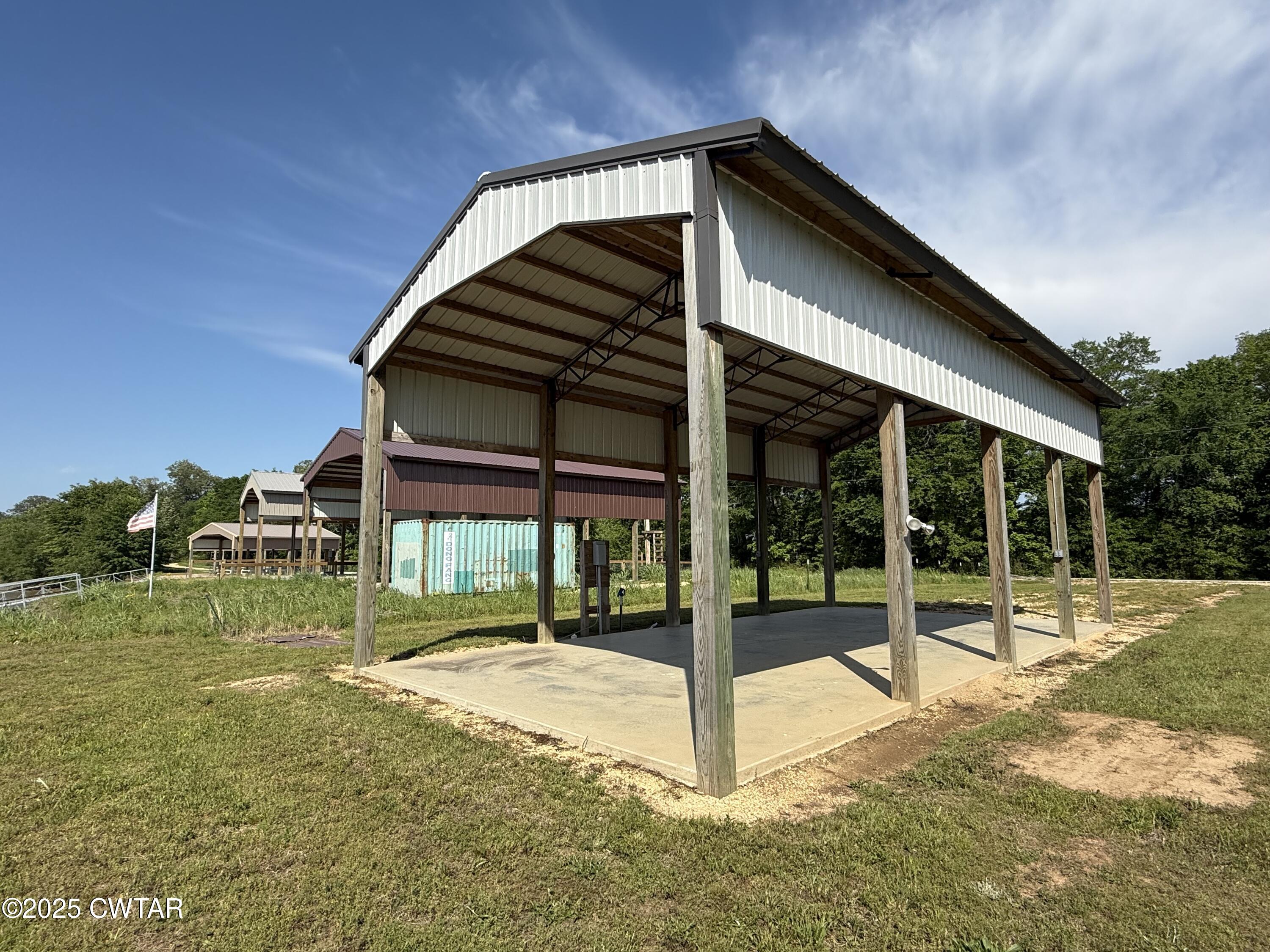 2857 Hardin Bottom River Road Clifton, TN 38425 - Photo 6 of 12 a view of a house with a yard