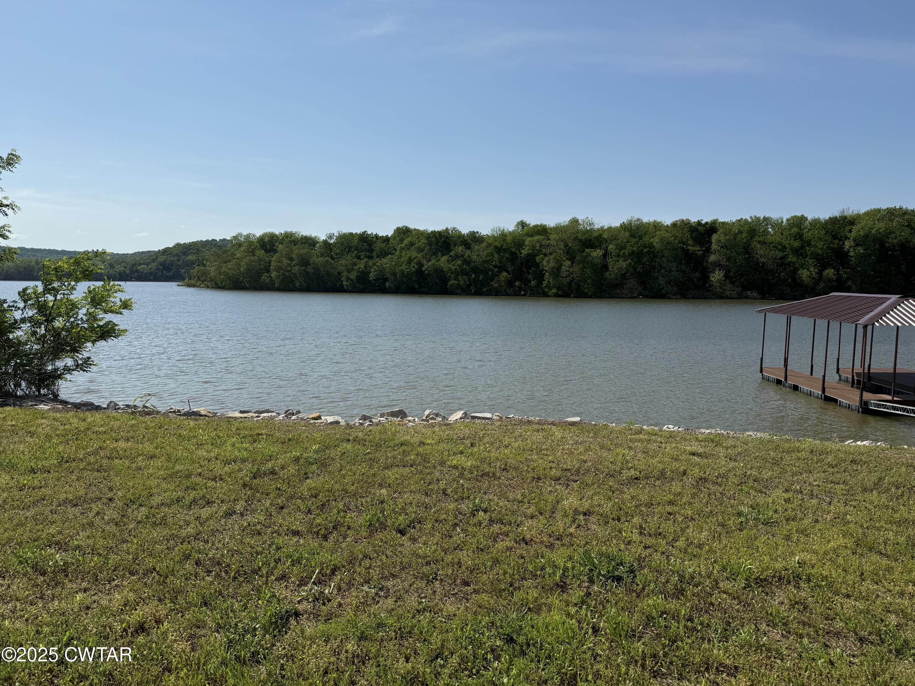 2857 Hardin Bottom River Road Clifton, TN 38425 - Photo 8 of 12 a view of lake with green space