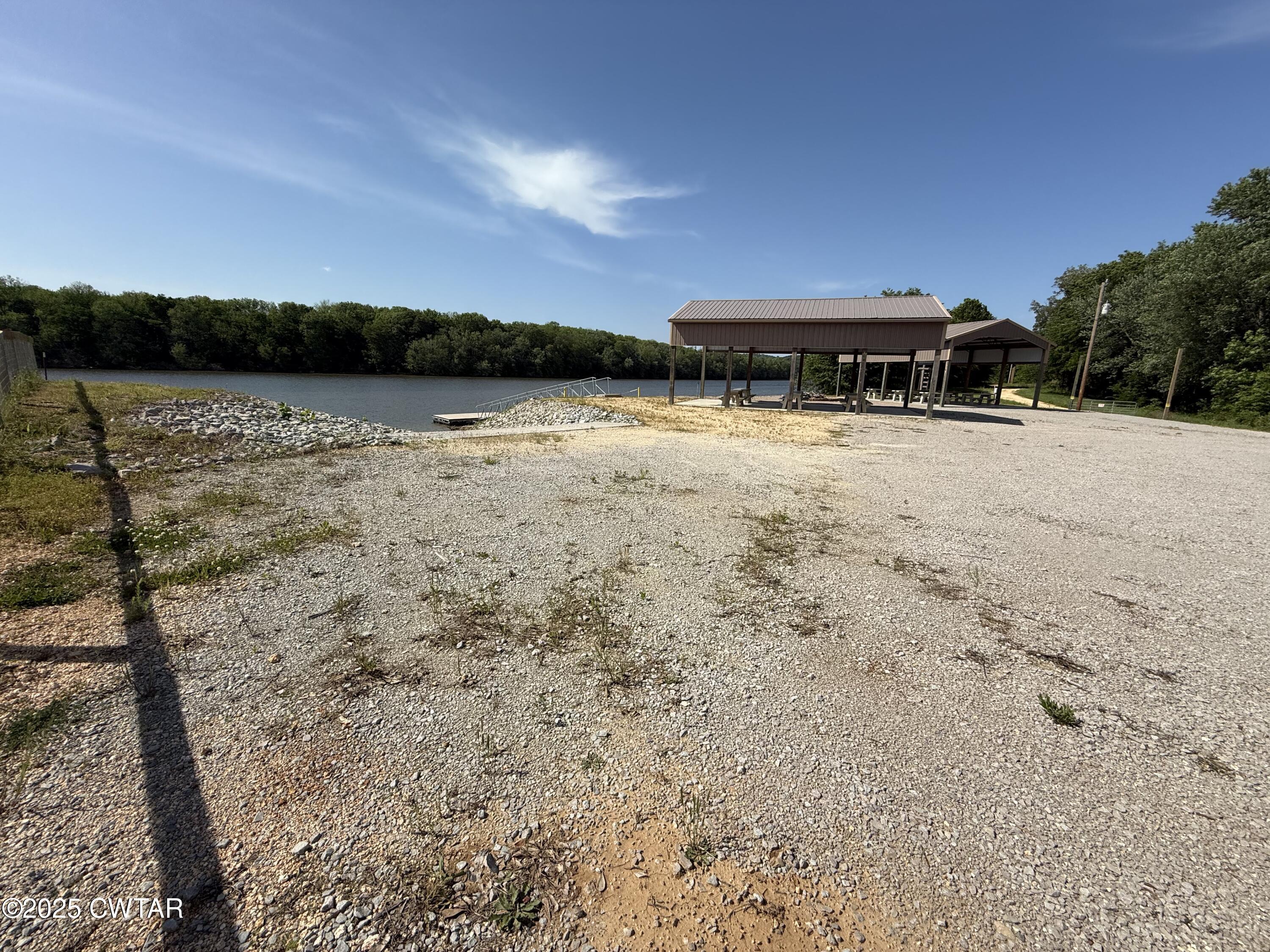 2857 Hardin Bottom River Road Clifton, TN 38425 - Photo 10 of 12 a front view of a house with a yard