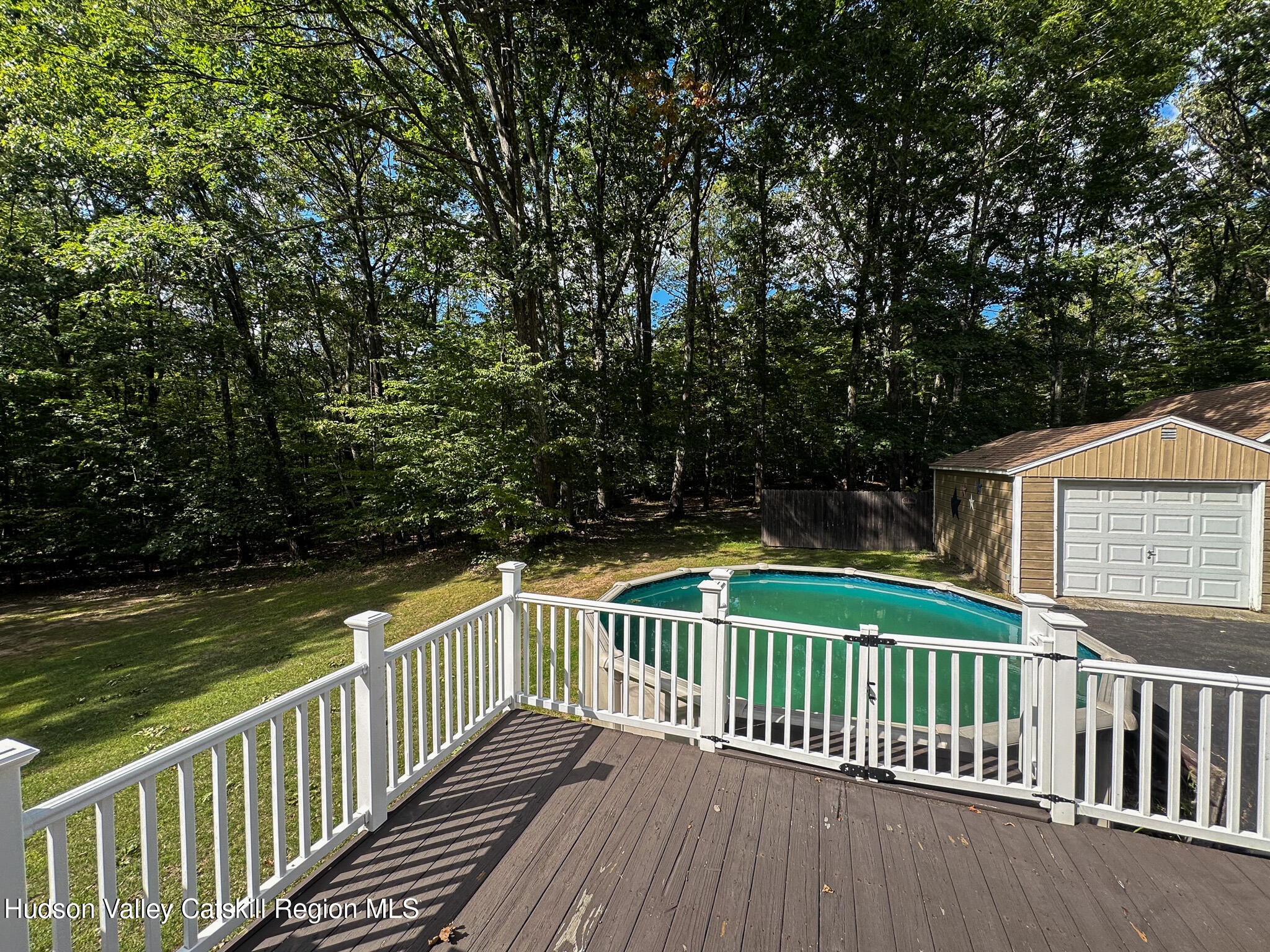 317 Scutt Road Greenville, NY 12083 - Photo 20 of 25 a view of balcony with wooden floor and fence