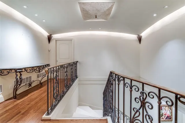 a view of entryway and hall with a front door