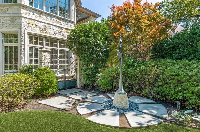 a backyard of a house with outdoor seating